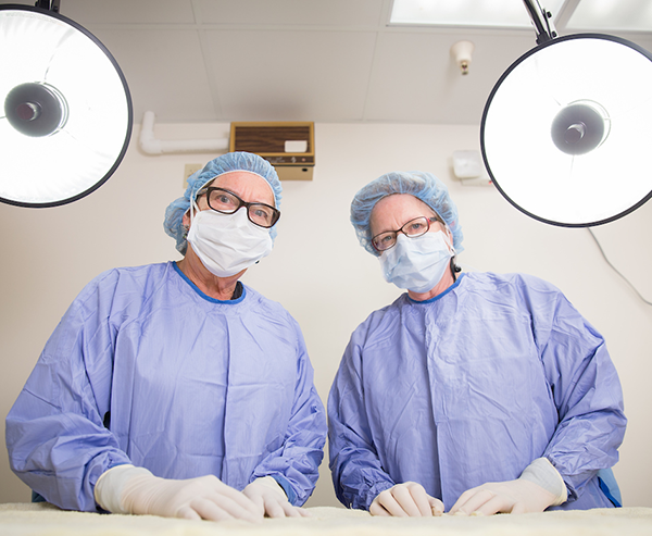 two-vets-looking-at-camera two-vets-looking-at-camera